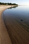 by the shore